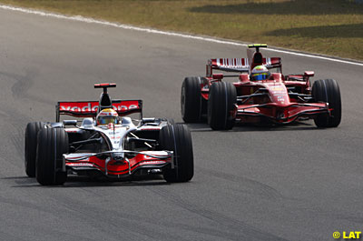Lewis Hamilton leads Felipe Massa